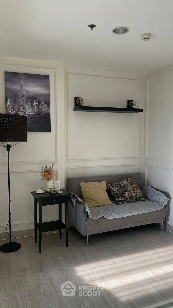 Chic living room with modern decor and cozy sofa in bright natural light