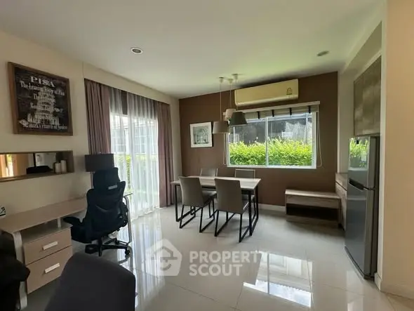 Modern study room with desk, dining table, and large window view.