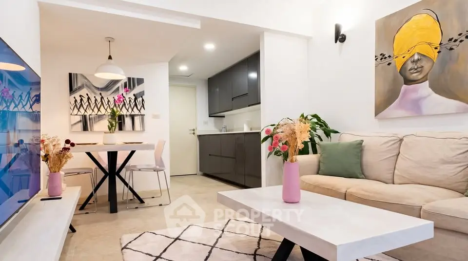Modern living room with stylish decor and open kitchen layout
