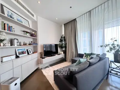 Stylish modern living room with cozy seating and elegant decor, perfect for relaxation and entertainment.