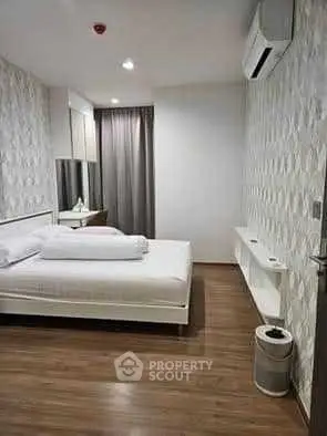 Modern bedroom with stylish decor and air conditioning