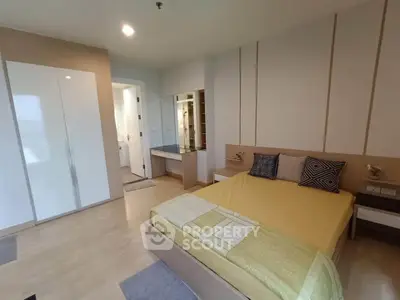 Spacious modern bedroom with ensuite bathroom and stylish decor