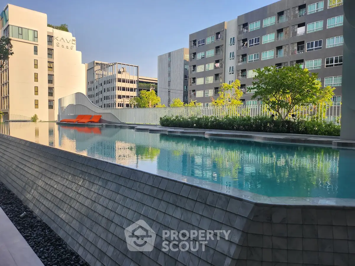 Luxurious rooftop pool with modern architecture and cityscape views