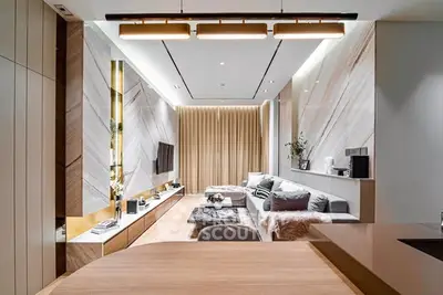 Luxurious modern living room with elegant decor and ambient lighting