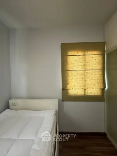 Cozy bedroom with minimalist design and soft lighting