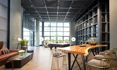 Luxurious modern living room with high ceilings and stylish decor