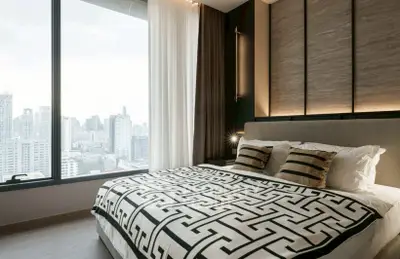 Luxurious bedroom with stunning city view and elegant decor