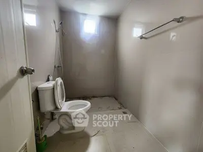 Spacious bathroom with minimalist design and natural light