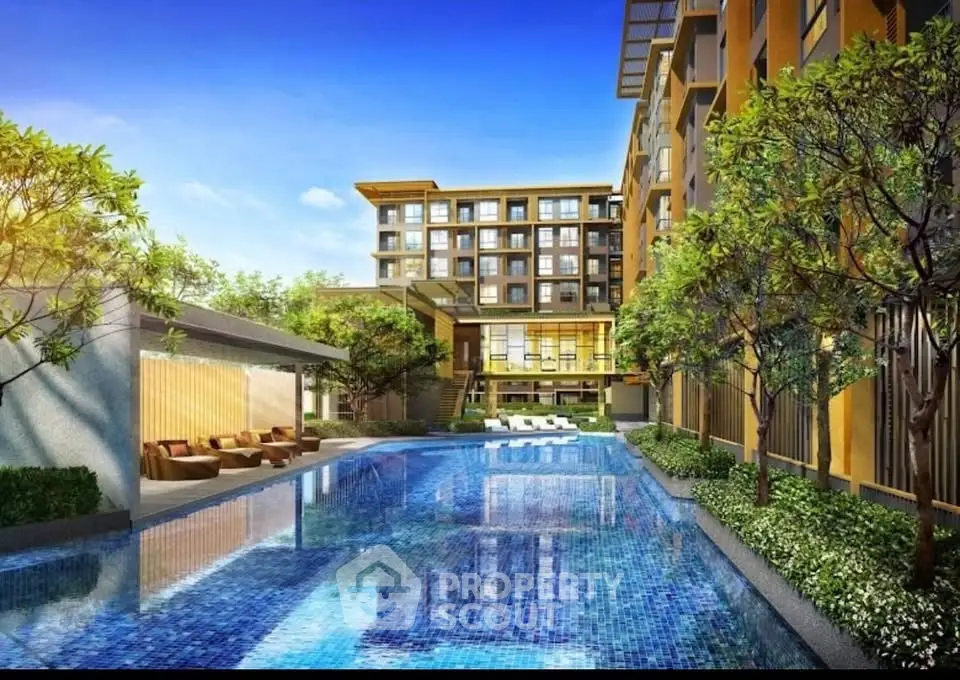 Luxurious modern apartment complex with stunning pool and lush greenery, perfect for upscale living.
