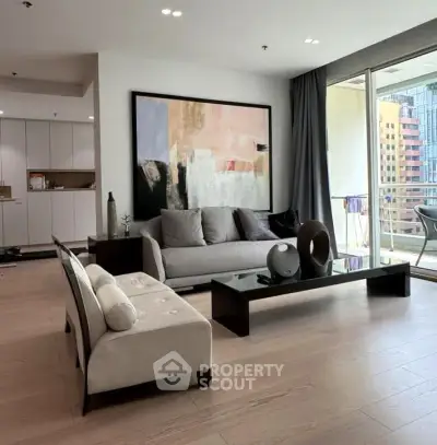 Modern living room with elegant decor and large balcony in urban apartment