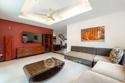 Spacious living room with modern decor and stylish furniture in a contemporary home.