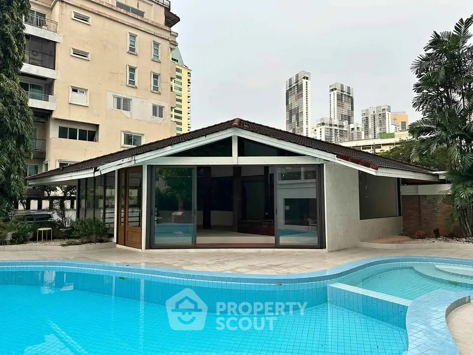 Stunning property with a spacious pool and modern architecture in a prime urban location.