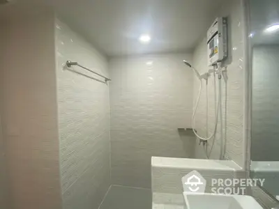 Modern bathroom with sleek shower and contemporary tile design