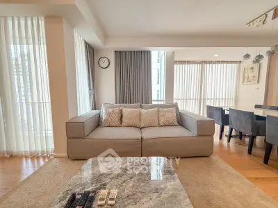 Spacious modern living room with elegant decor and natural light