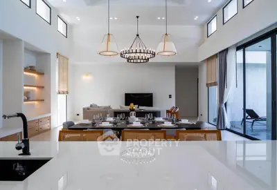 Luxurious modern living room with elegant dining area and large windows