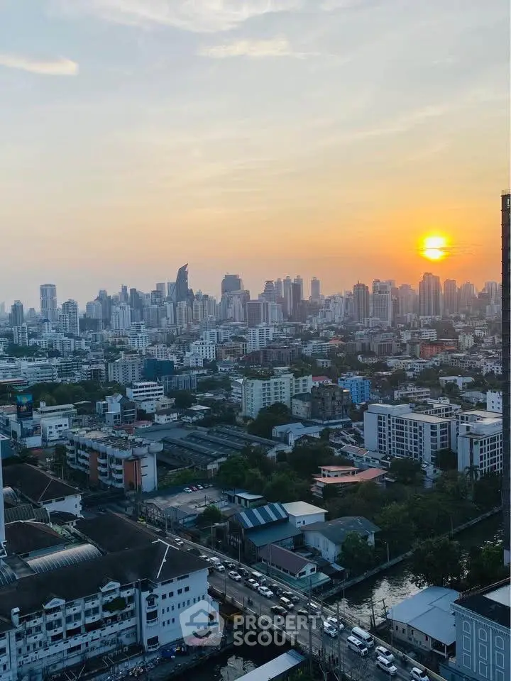 Stunning cityscape view at sunset showcasing urban skyline and vibrant city life.