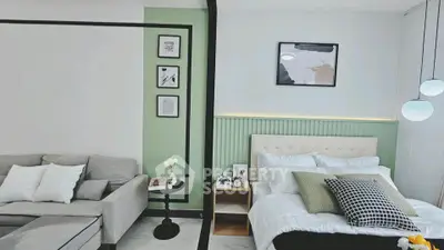 Modern bedroom with stylish decor and cozy seating area