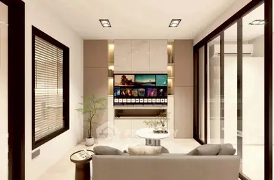 Modern living room with sleek design, large windows, and stylish furniture, perfect for relaxation and entertainment.