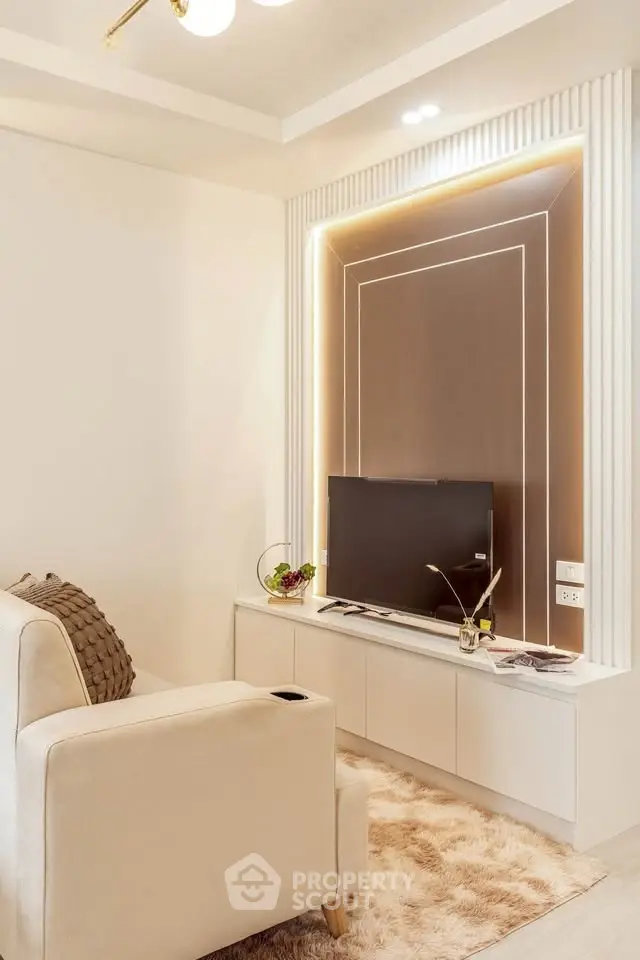 Modern living room with stylish TV setup and cozy decor