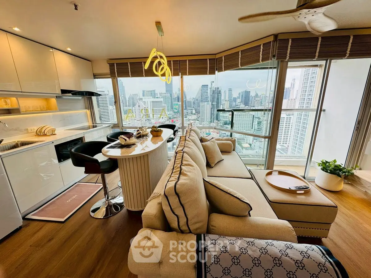 Luxurious high-rise living room with panoramic city views and modern open kitchen.