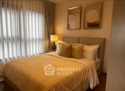 Cozy and elegant bedroom with plush bedding and soft lighting, perfect for relaxation.