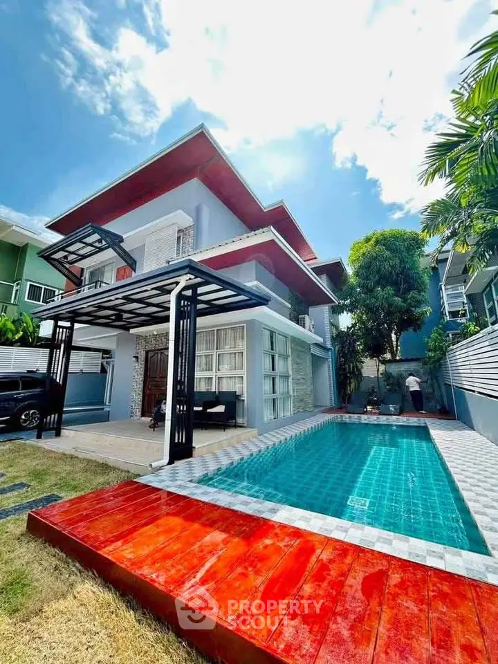 Stunning modern house with private pool and lush garden, perfect for luxury living.