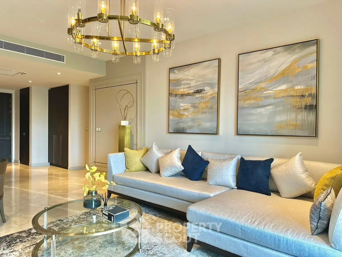 Luxurious living room with elegant decor and modern chandelier