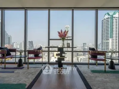 Luxurious high-rise apartment with stunning city skyline view and elegant interior design.