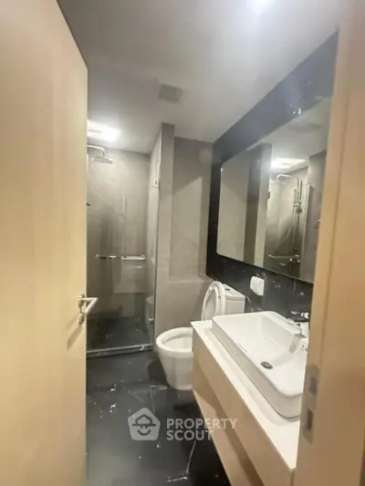 Modern bathroom with sleek design and spacious shower area