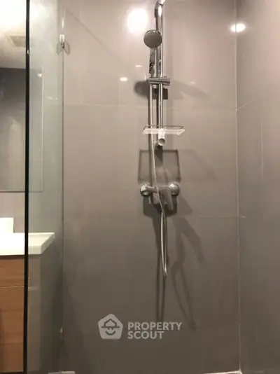 Modern bathroom with sleek shower fixtures and minimalist design