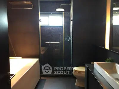 Modern bathroom with sleek design and glass shower enclosure