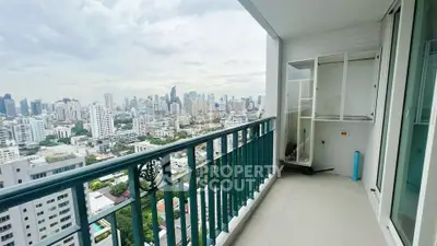 Spacious balcony with stunning city skyline view, perfect for relaxation and enjoying urban living.