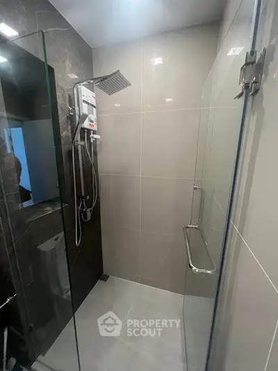 Modern bathroom with sleek shower design and glass enclosure