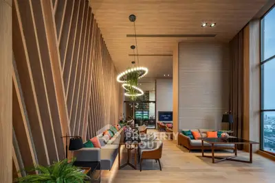 Luxurious modern living room with high ceilings and panoramic city views