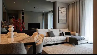 Elegant modern living room with cozy sectional sofa and stylish decor