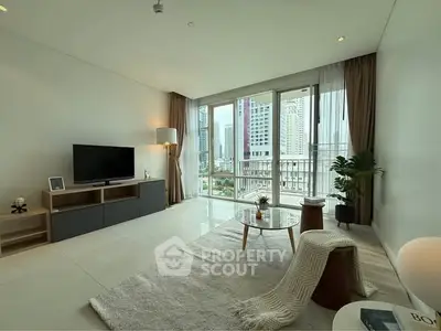 Spacious modern living room with city view and elegant decor