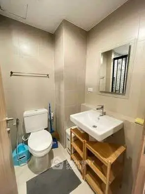 Modern bathroom with sleek fixtures and neutral tones