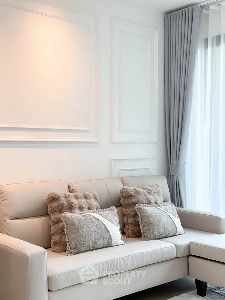 Elegant living room with plush sofa and stylish decor