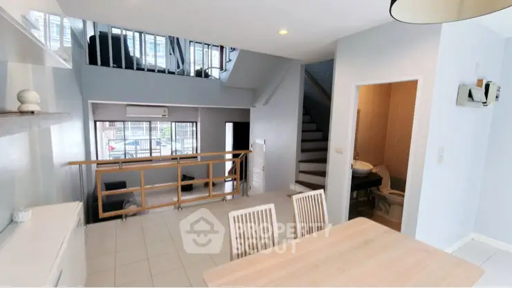 Spacious multi-level living area with modern design and natural light