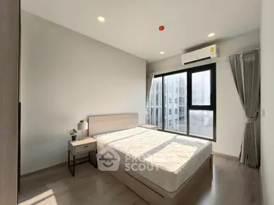 Bright and modern bedroom with large window and minimalist decor