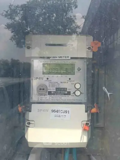 Electricity meter installation for property energy monitoring.