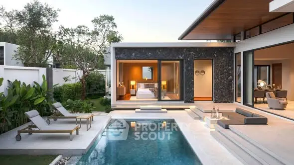 Luxurious modern villa with private pool and elegant outdoor seating area.