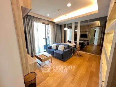 Modern living room with wooden flooring and stylish furniture