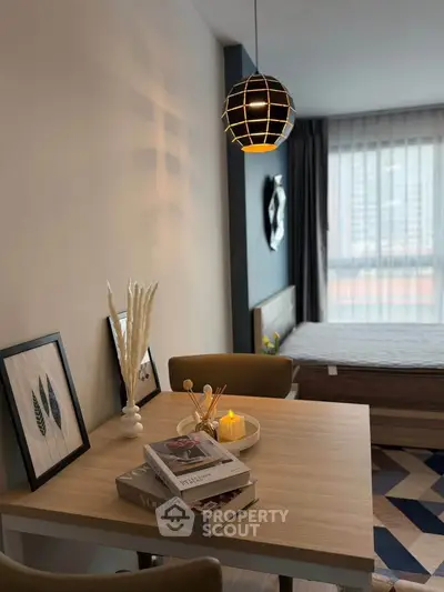 Cozy modern bedroom with stylish decor and natural light