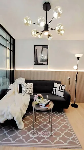 Stylish modern living room with elegant lighting and cozy decor