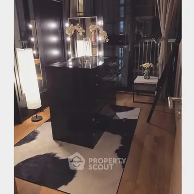 Stylish modern interior with elegant lighting and chic decor in a cozy room setting.