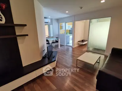 Modern living room with open layout and stylish furniture in a contemporary apartment.