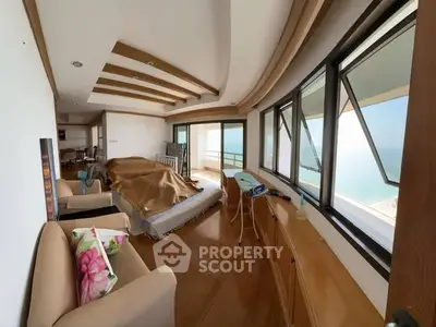 Spacious living room with ocean view and modern decor
