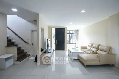 Spacious modern living room with sleek design and natural light