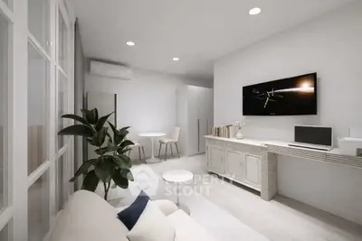 Modern living room with sleek decor and wall-mounted TV